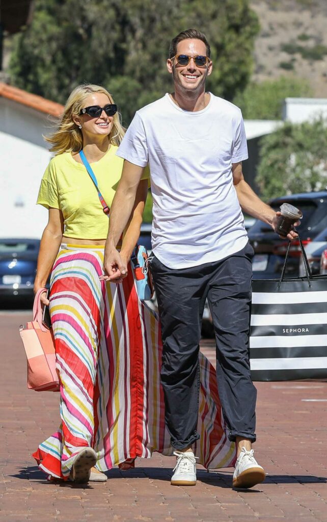 Paris Hilton in a Yellow Cropped Tee
