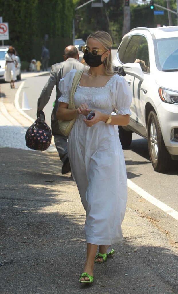 Rebecca Rittenhouse in a White Dress