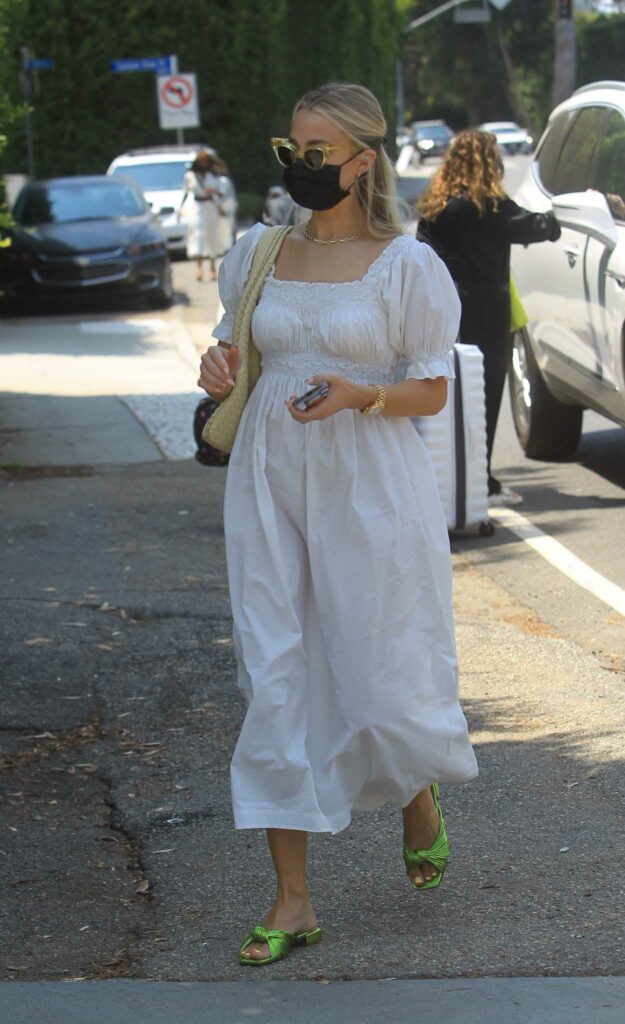 Rebecca Rittenhouse in a White Dress