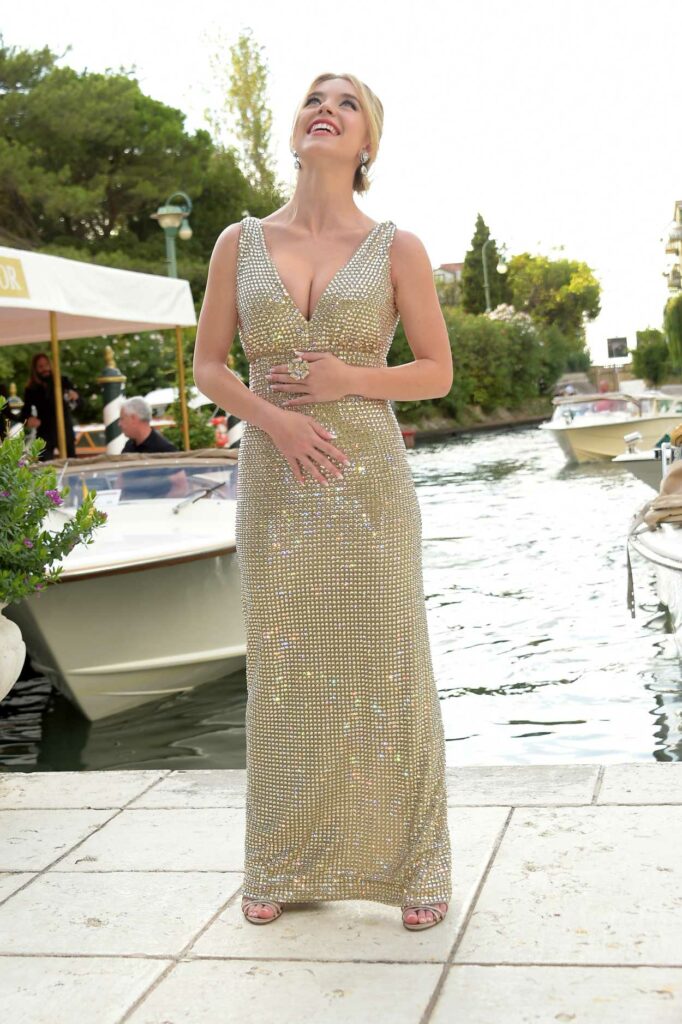 Sydney Sweeney in a Gold Dress
