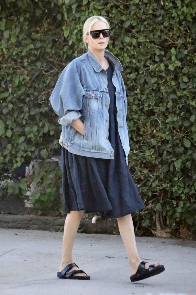Charlize Theron in a Blue Denim Jacket