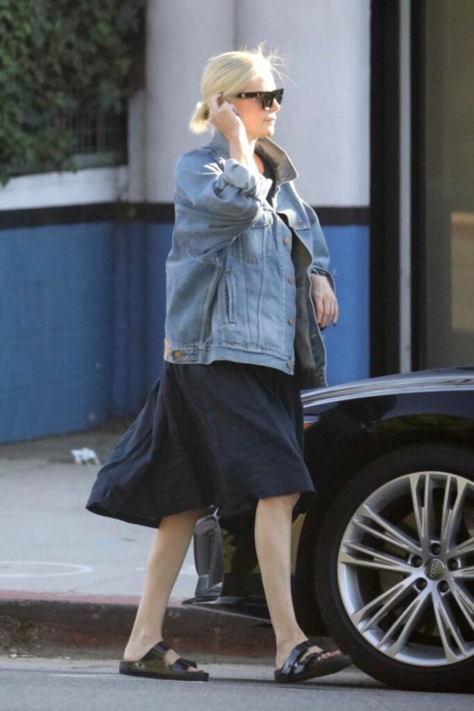 Charlize Theron in a Blue Denim Jacket