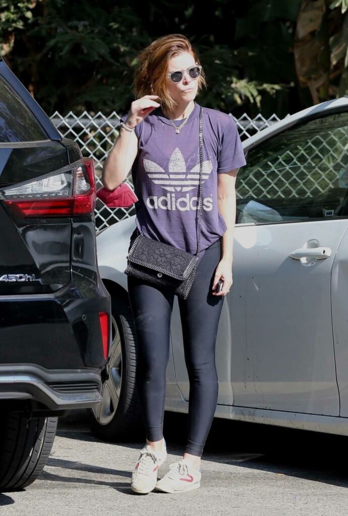 Kate Mara in a Purple Adidas Tee