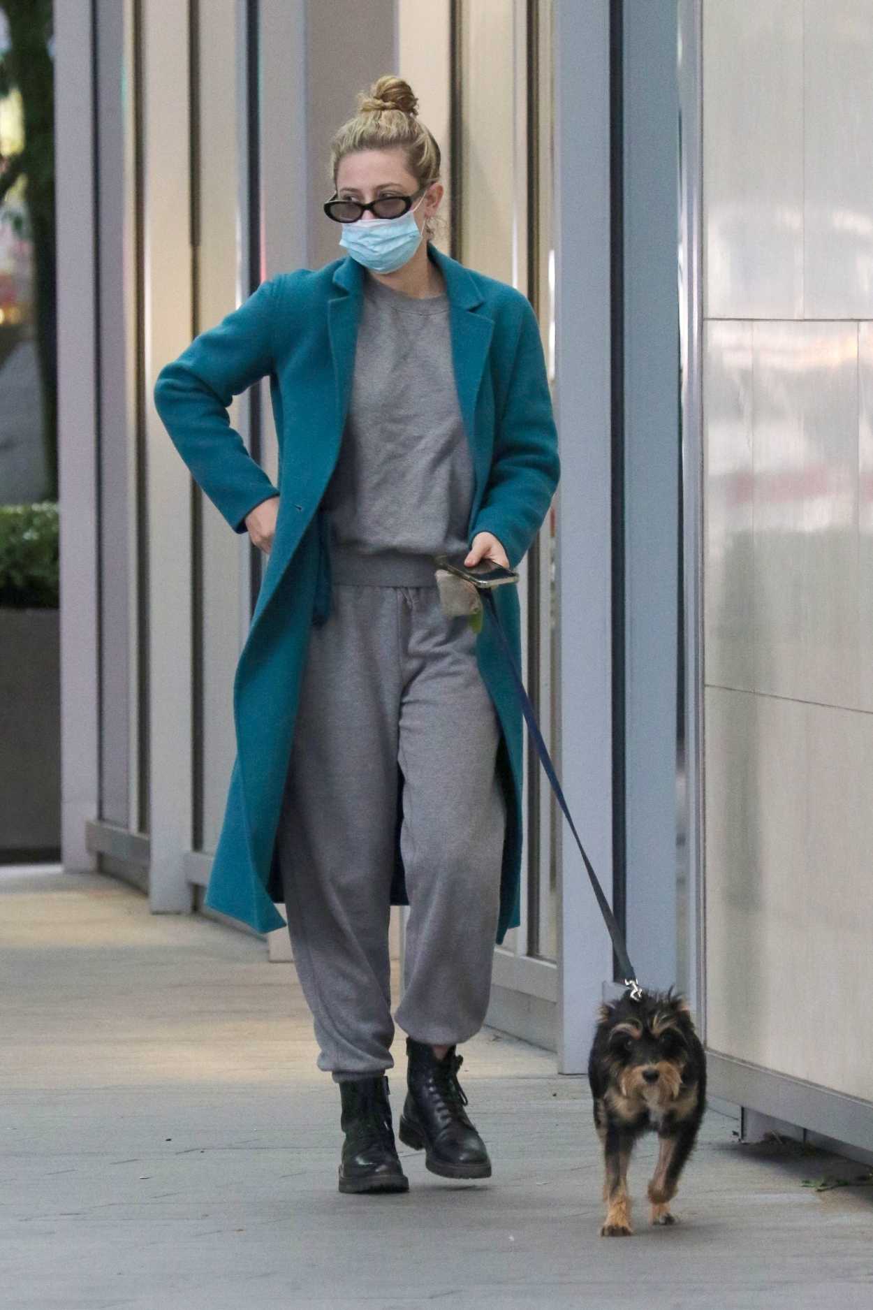 Lili Reinhart in a Grey Sweatsuit Walks Her Dog Milo in Vancouver 09/20