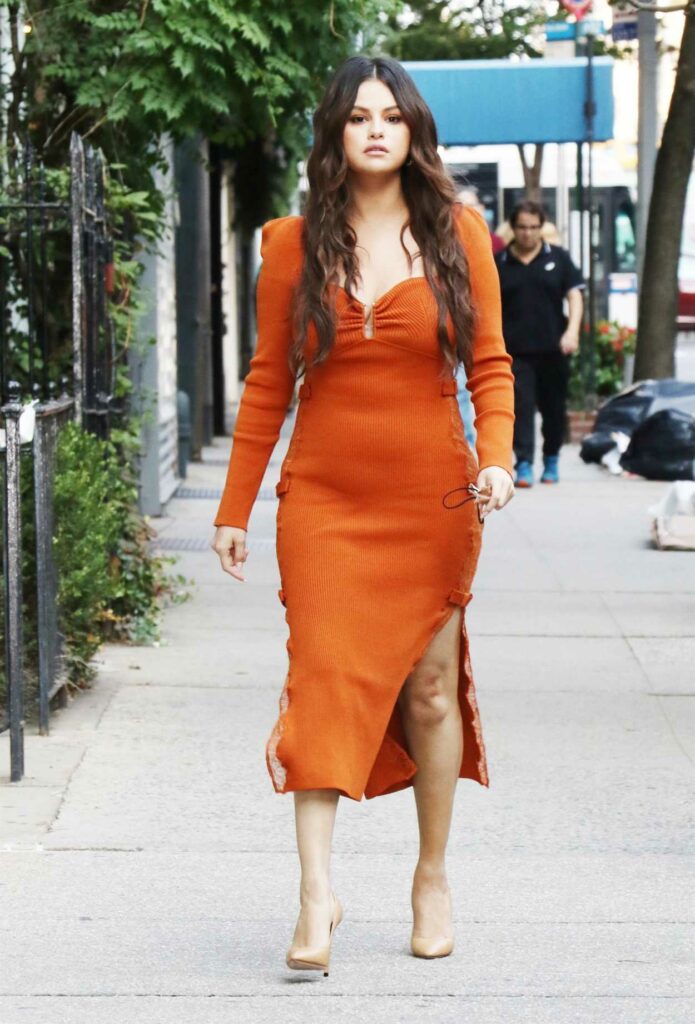 Selena Gomez in an Orange Dress