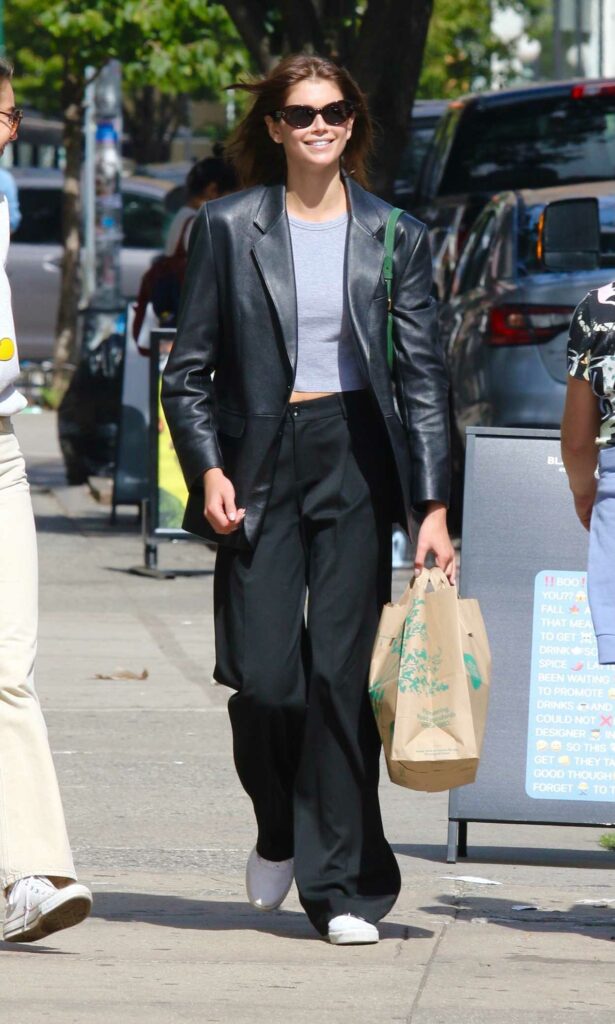 Kaia Gerber in a Black Leather Blazer