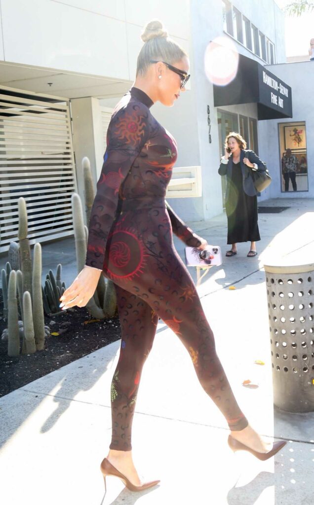 Khloe Kardashian in a Brown Patterned Catsuit