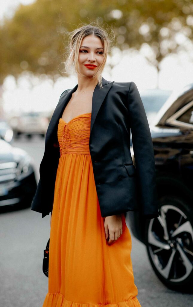 Madelyn Cline in an Orange Dress