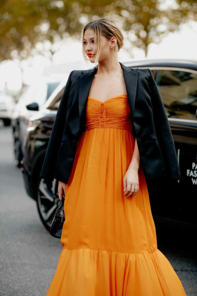 Madelyn Cline in an Orange Dress
