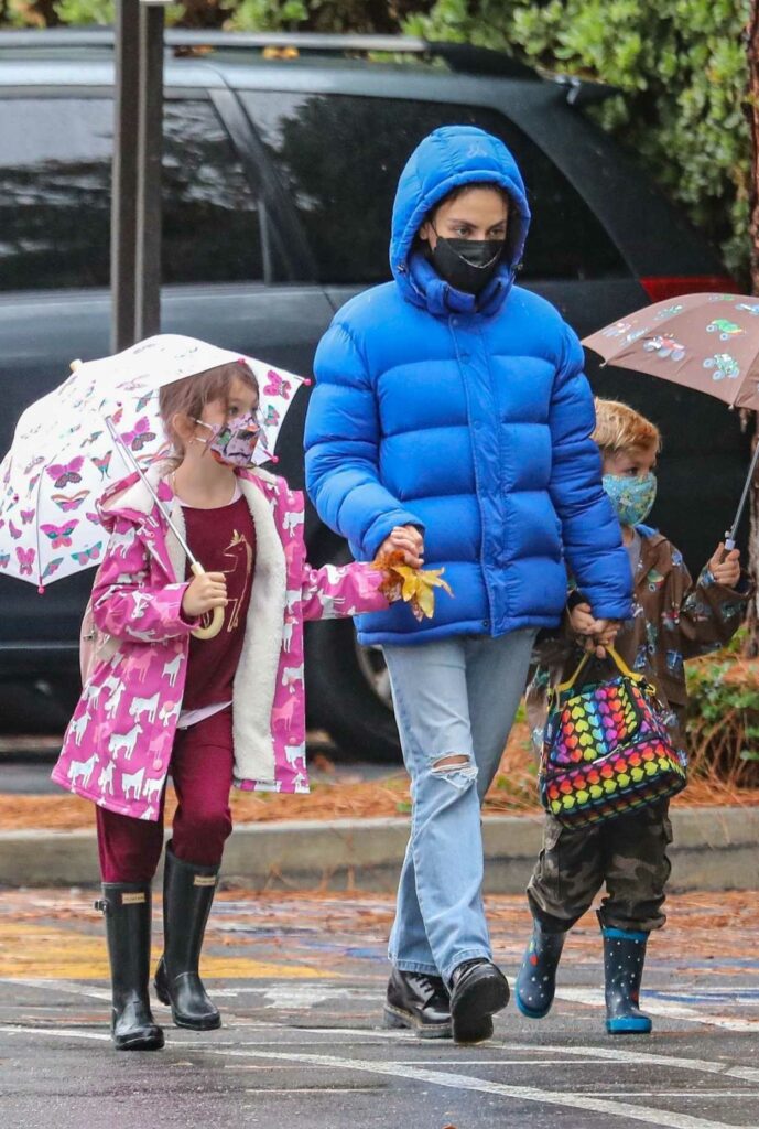 Mila Kunis in a Blue Puffer Jacket