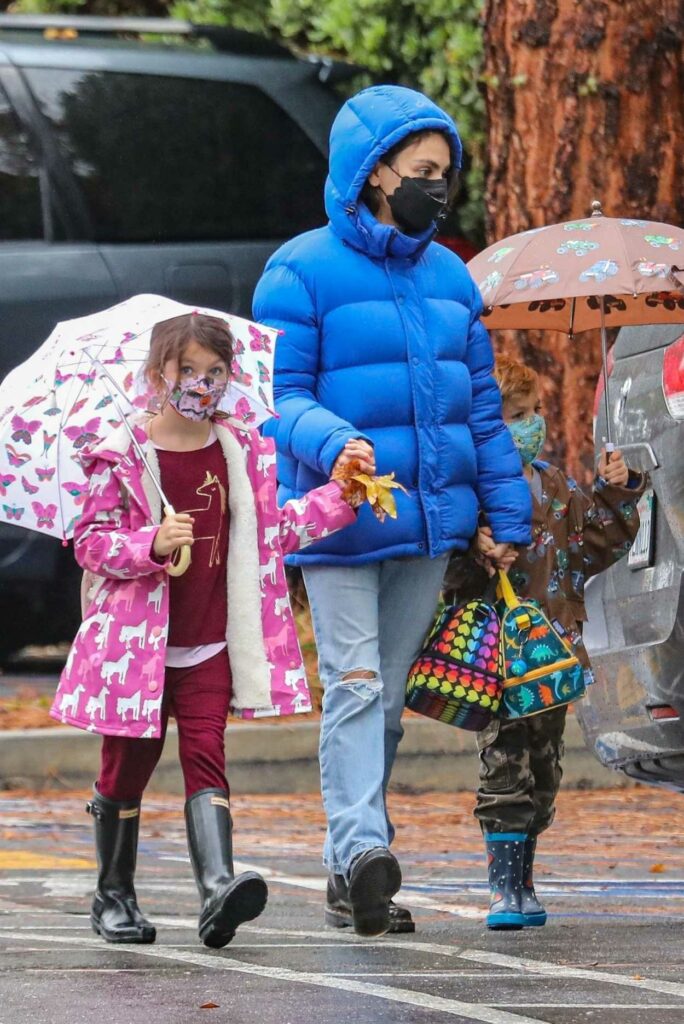 Mila Kunis in a Blue Puffer Jacket