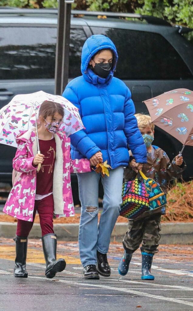 Mila Kunis in a Blue Puffer Jacket