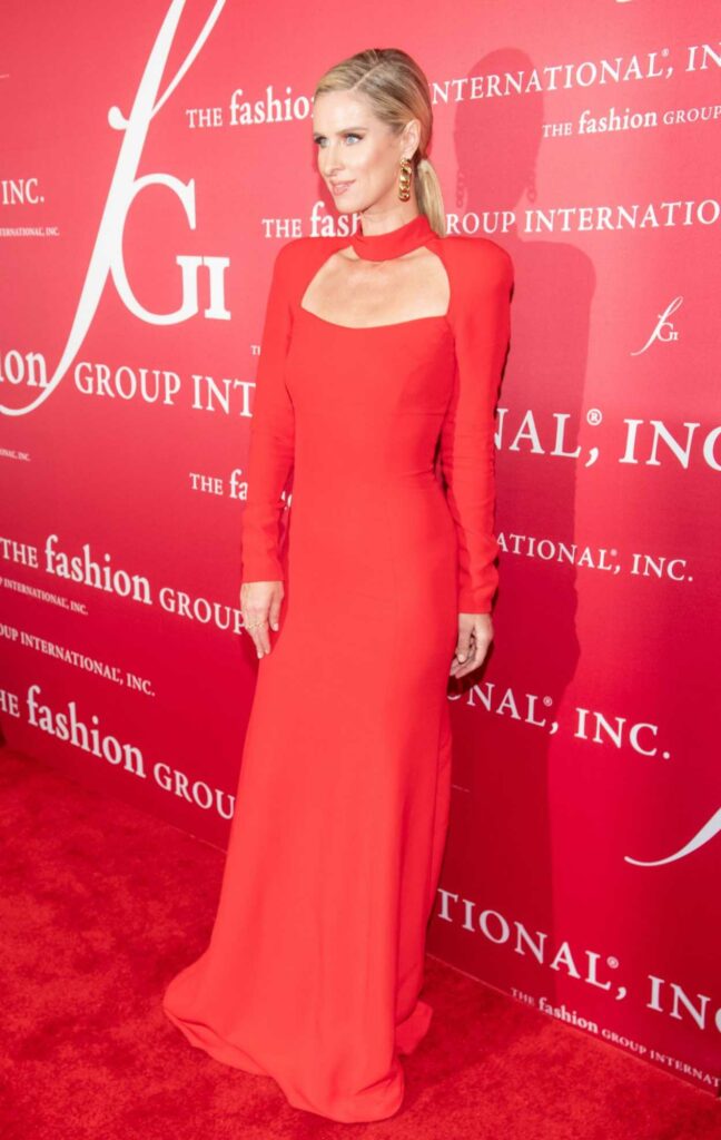 Nicky Hilton in a Red Dress Attends FGI's 2021 Night of Stars at Cipriani South Street in New York City 10/13/2021