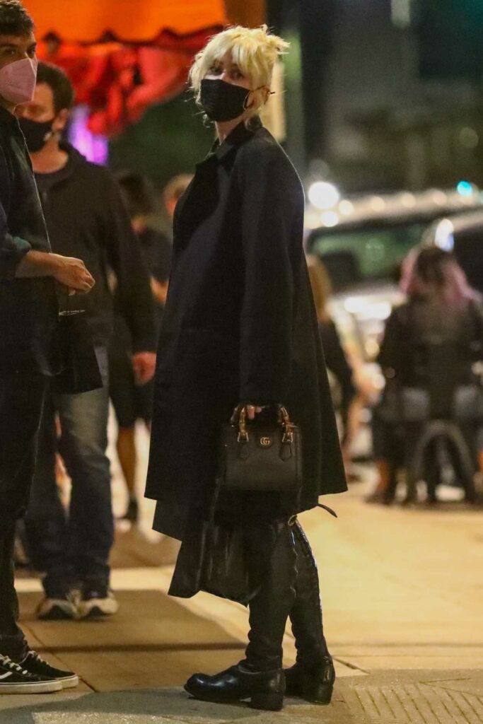 Miley Cyrus in a Black Coat