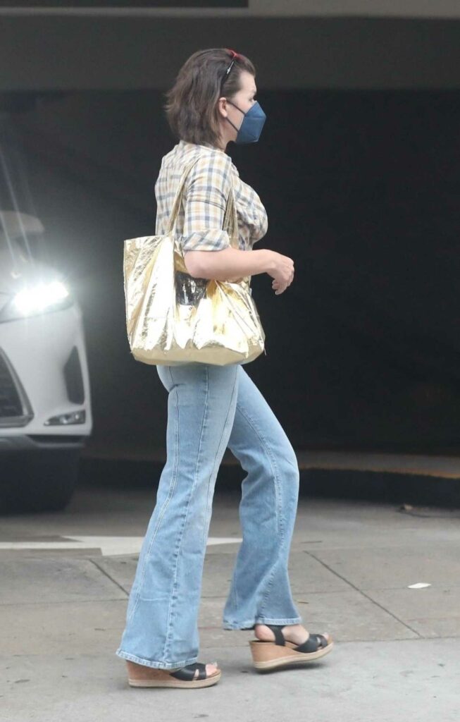 Milla Jovovich in a Plaid Shirt