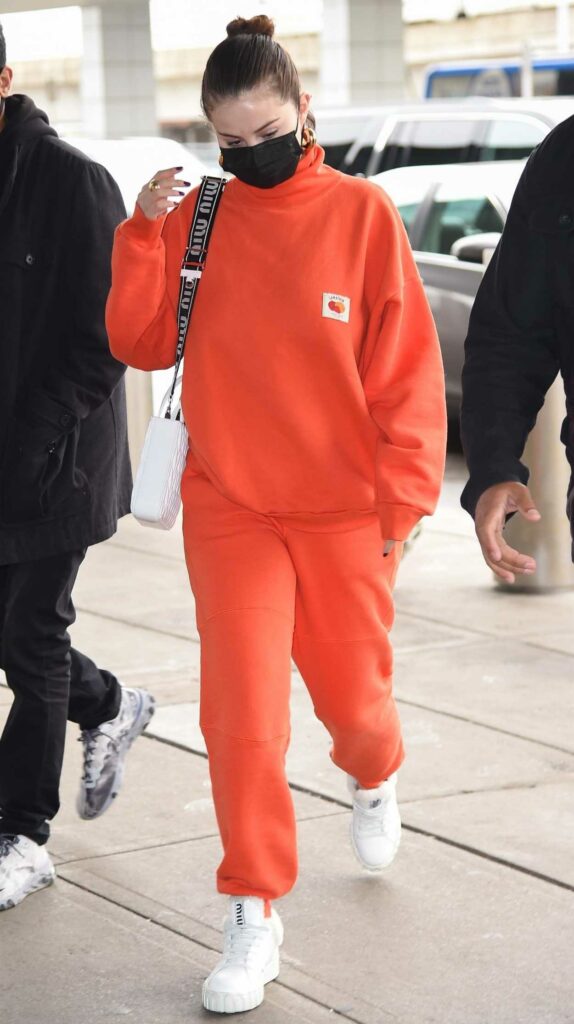 Selena Gomez in an Orange Sweatsuit
