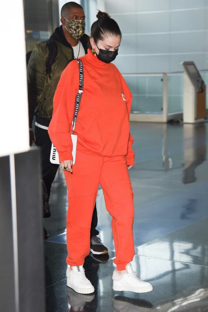 Selena Gomez in an Orange Sweatsuit