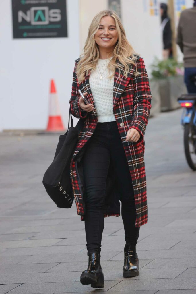Sian Welby in a Plaid Coat