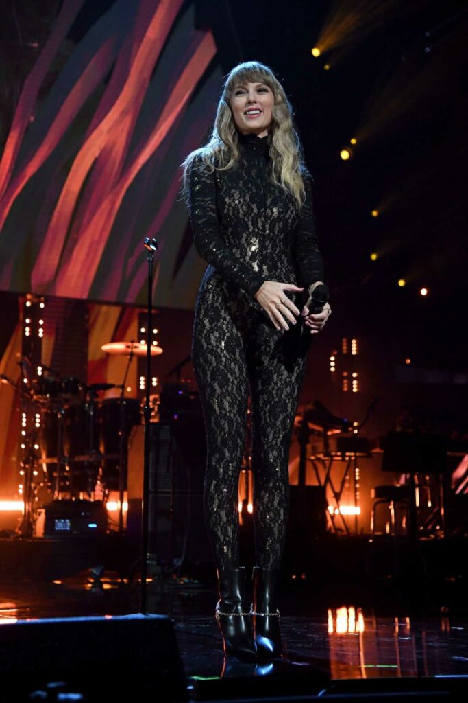 Taylor Swift in a Black Catsuit