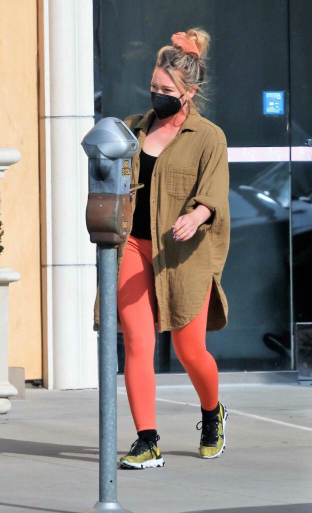 Hilary Duff in a Red Leggings