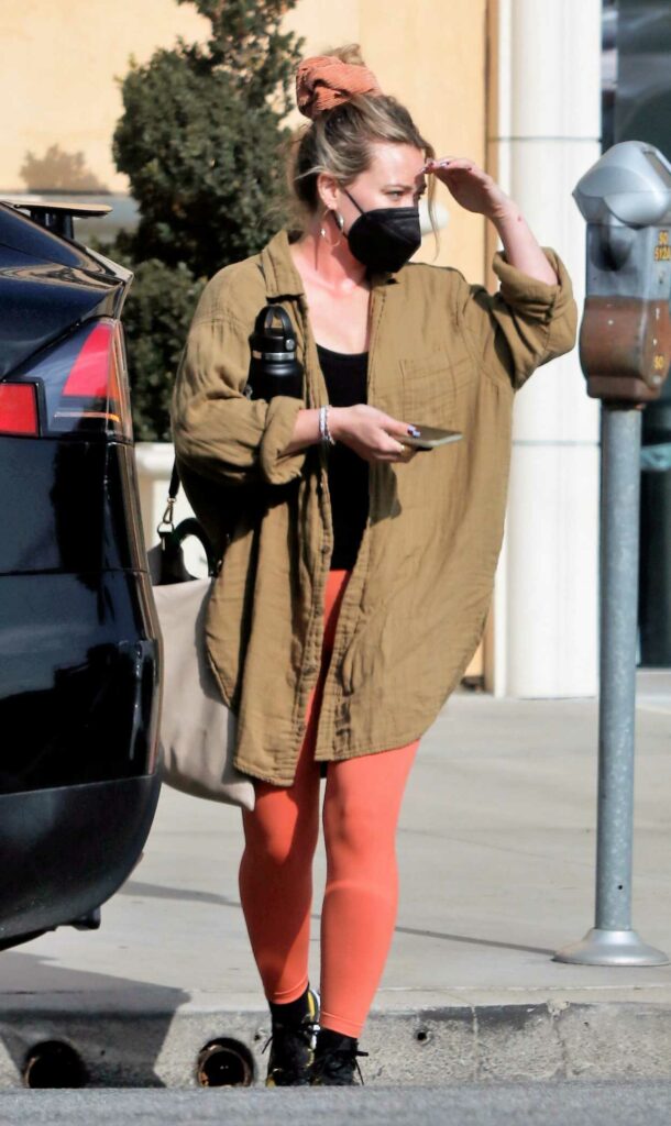 Hilary Duff in a Red Leggings