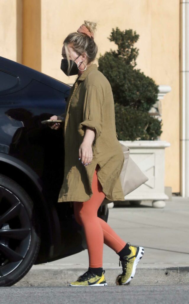 Hilary Duff in a Red Leggings