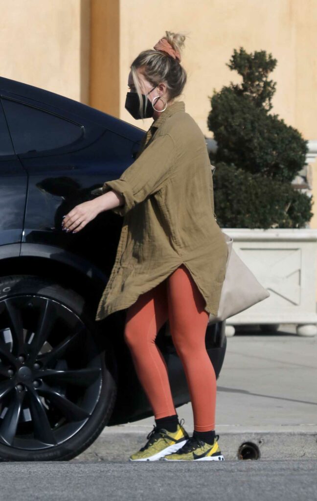 Hilary Duff in a Red Leggings