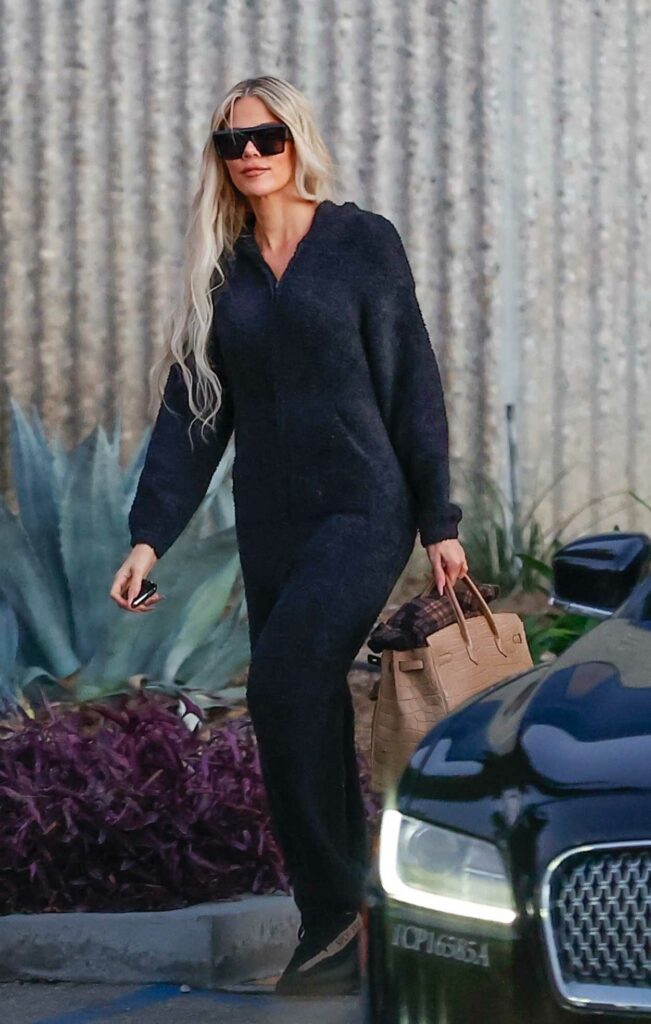 Khloe Kardashian in a Black Jumpsuit