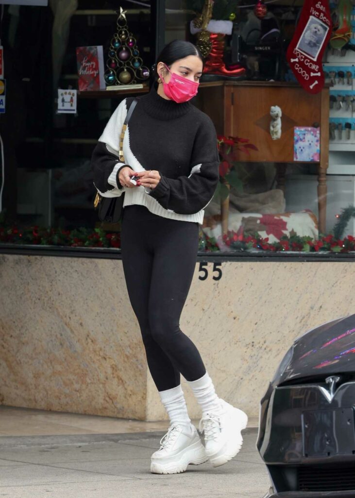Vanessa Hudgens in a Pink Protective Mask