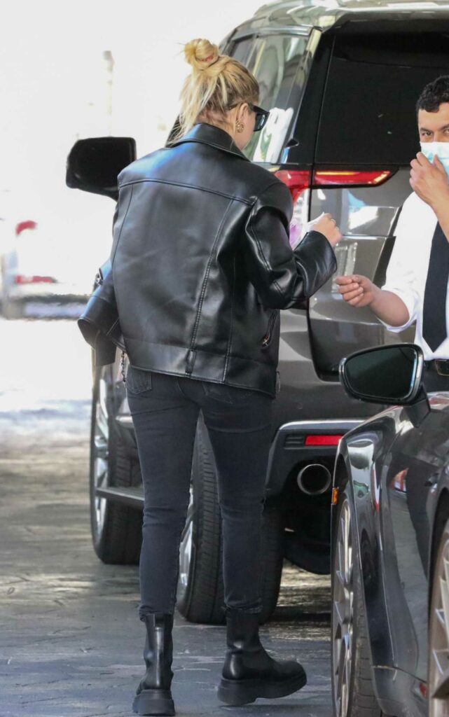 Ashley Benson in a Black Leather Jacket