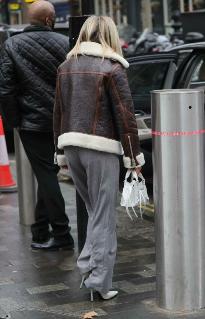 Ashley Roberts in a Grey Pants
