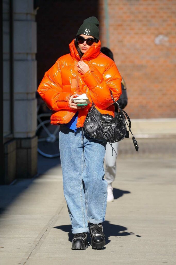 Dua Lipa in an Orange Puffer Jacket