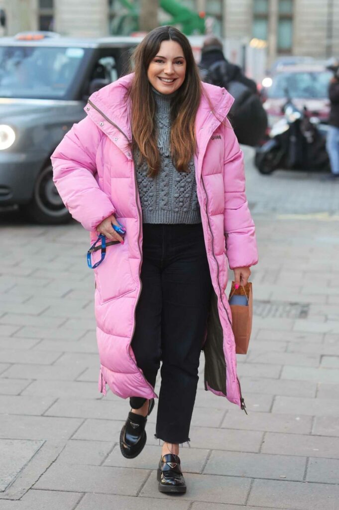 Kelly Brook in a Pink Puffer Coat