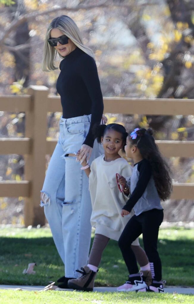 Khloe Kardashian in a Blue Ripped Jeans