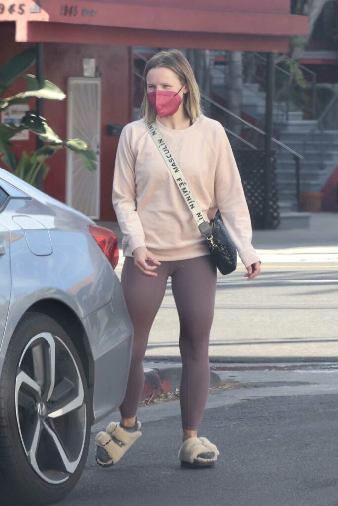 Kristen Bell in a Red Protective Mask