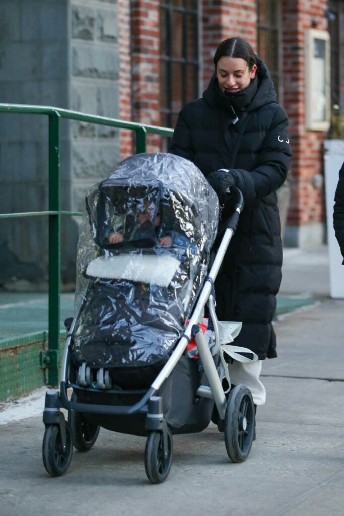 Lea Michele in a Black Puffer Coat