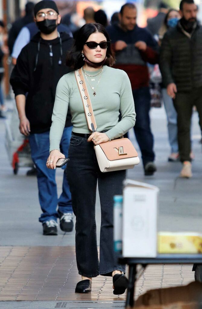Lucy Hale in an Olive Sweater