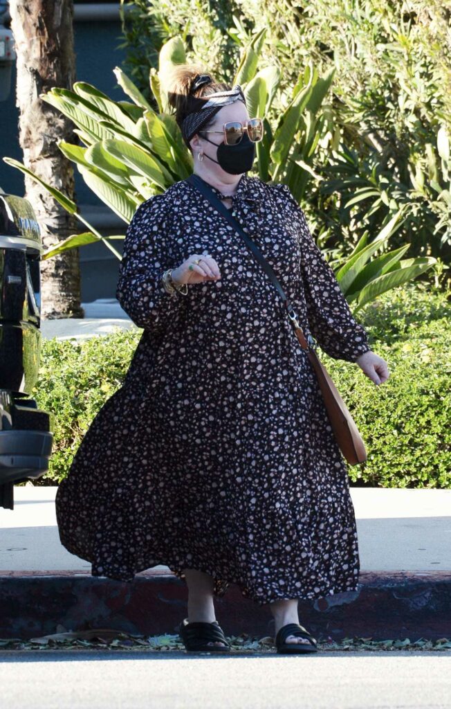 Melissa McCarthy in a Black Protective Mask