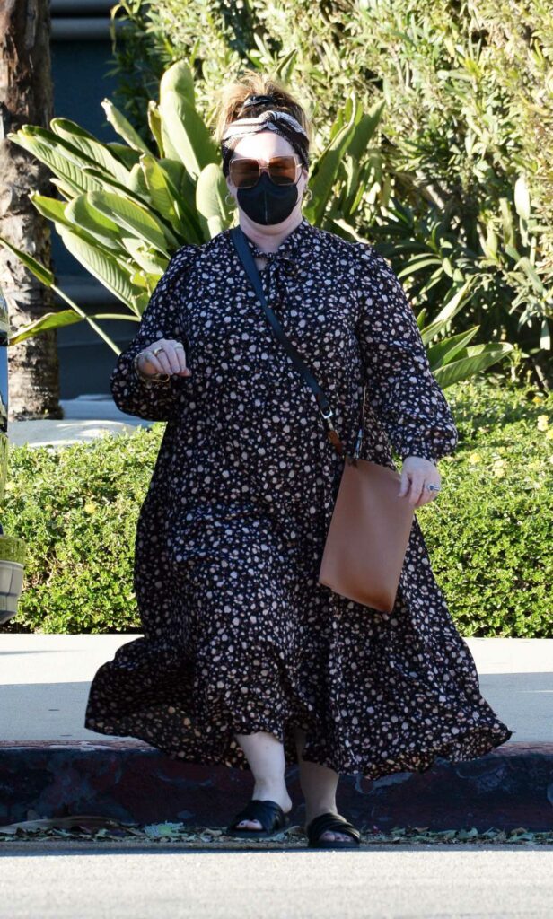 Melissa McCarthy in a Black Protective Mask
