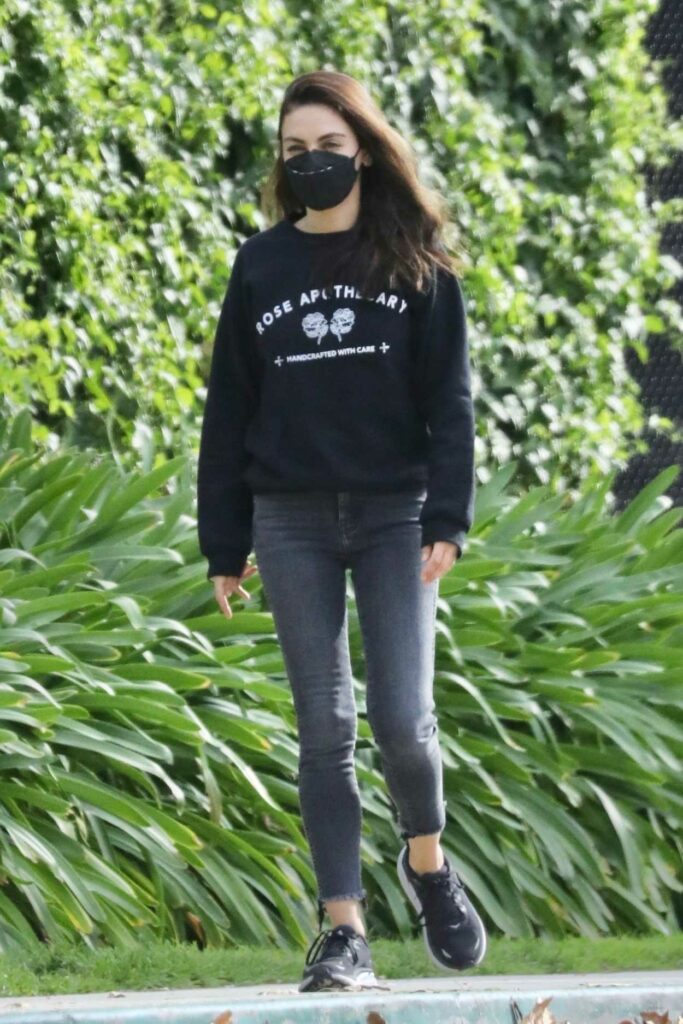 Mila Kunis in a Black Sweatshirt