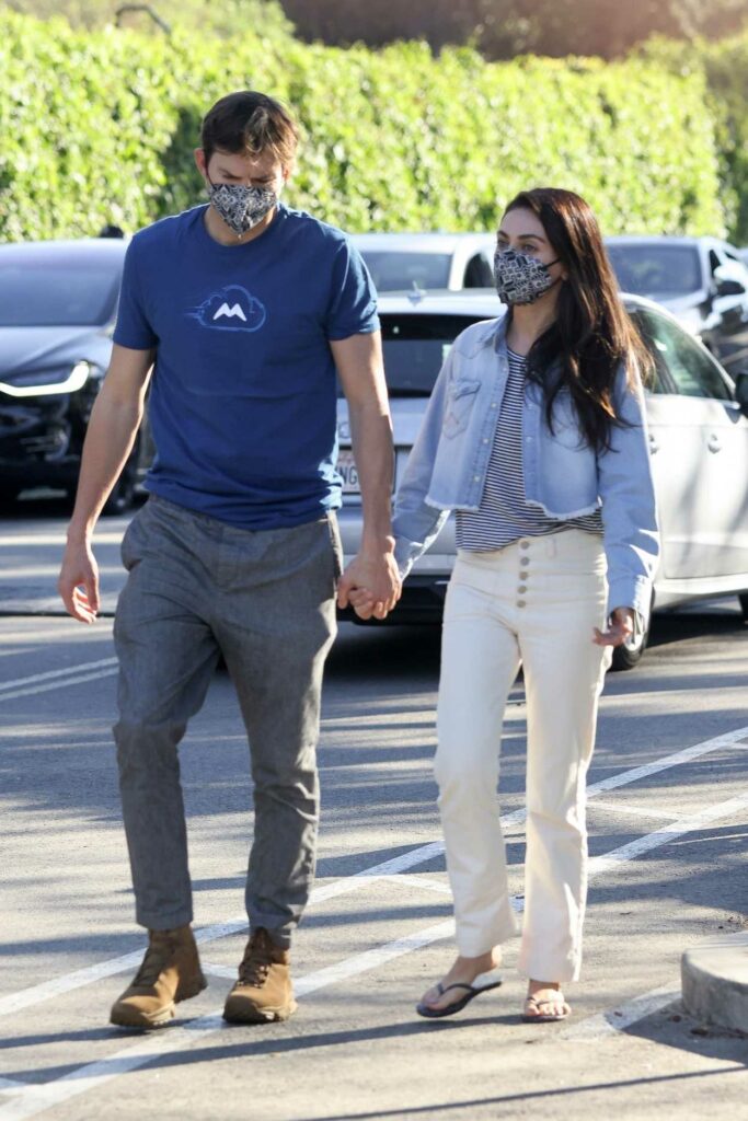 Mila Kunis in a White Pants