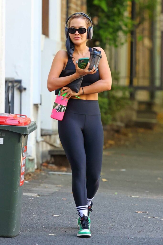 Rita Ora in a Black Workout Ensemble