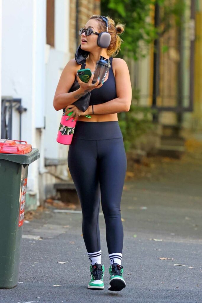 Rita Ora in a Black Workout Ensemble