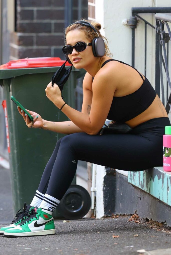 Rita Ora in a Black Workout Ensemble