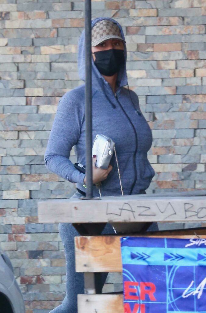 Amber Rose in a Black Protective Mask