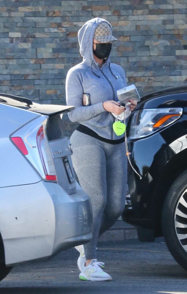 Amber Rose in a Black Protective Mask