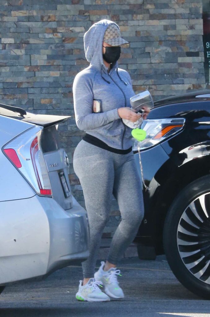 Amber Rose in a Black Protective Mask