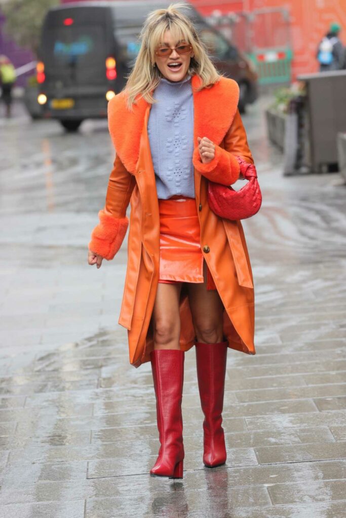 Ashley Roberts in an Orange Leather Coat