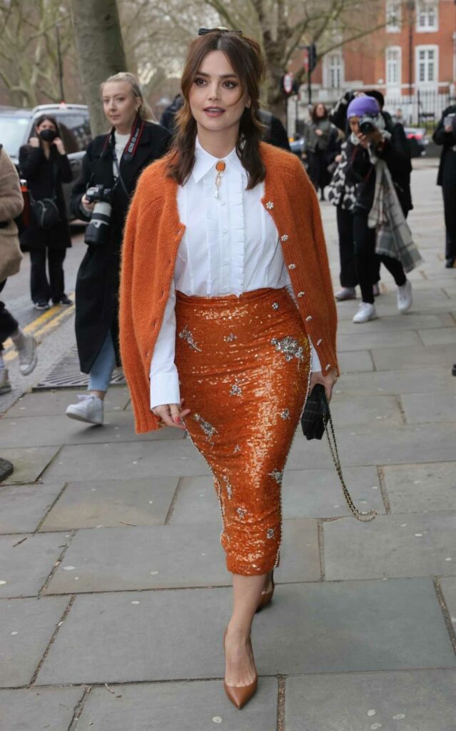 Jenna Coleman in an Orange Cardigan