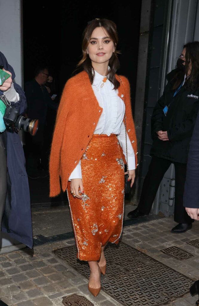 Jenna Coleman in an Orange Cardigan
